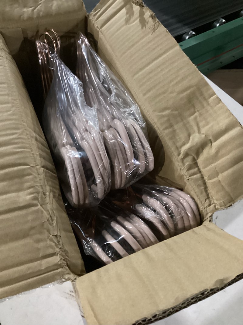 Condition photo showing New/Like New for SONGMICS 24 Pack Pants Hangers, 16.7 Inch Coat Hangers with Rose Gold Colored Movable Clips, Heavy-Duty, Non-Slip, Space-Saving, for Pants, Skirts, Dresses, Light Pink UCRF14PK24