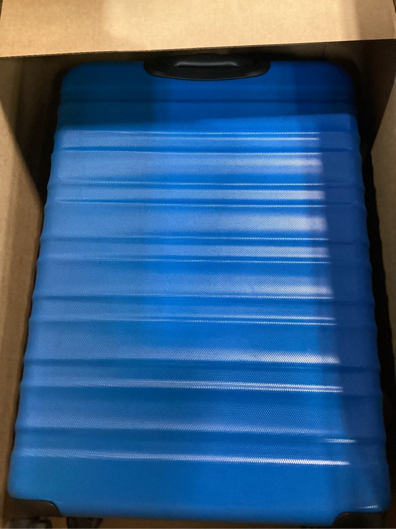 Condition photo showing Good Condition for Amazon Basics 30" Hardside Large Checked Luggage, Hardshell Suitcase With Wheels, Expandable For Up to 15% More Space, With Scratch-Resistant Surface, Four Multi-directional Wheels, Light Blue