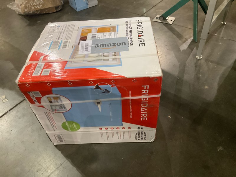 Condition photo showing New/Like New for Frigidaire EFR176 1.6 cu. ft. Retro Bar Fridge with Side Bottle Opener (Blue)