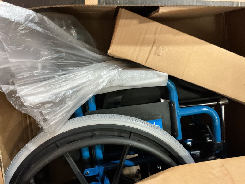 Condition photo showing New/Like New for medline pediatric wheelchair with 12" wide nylon seat with seat belt, 250 lb. weight capacity, telescoping handles, swing-back desk-length arms, swing-away footrests & vibrant blue frame 12" wide seat