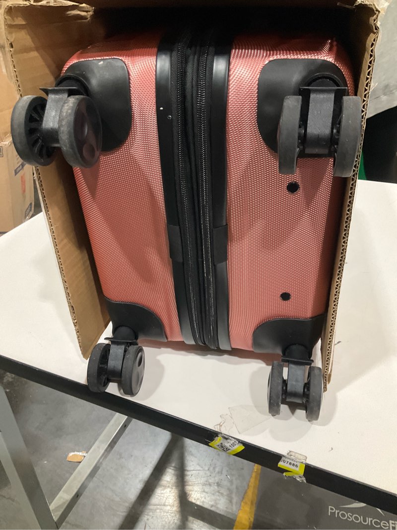 Condition photo showing As Is for Amazon Basics 21" Hardside Carry-On Luggage, Hardshell Suitcase With Wheels, Expandable For Up to 25% More Space, With Scratch-Resistant Surface, Four Multi-directional Wheels, Rose Gold Rose Gold Carry-On