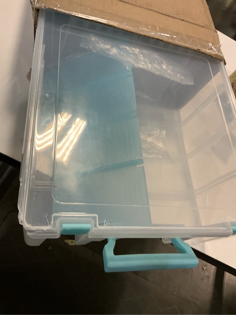 Condition photo showing As Is for ArtBin 6990SA Super Satchel Double Deep Compartment Box - Art Storage with 8 Removable Compartments, Smart Closure for Craft Supplies (Clear & Aqua- Pack of 1) Clear & Aqua Pack of 1