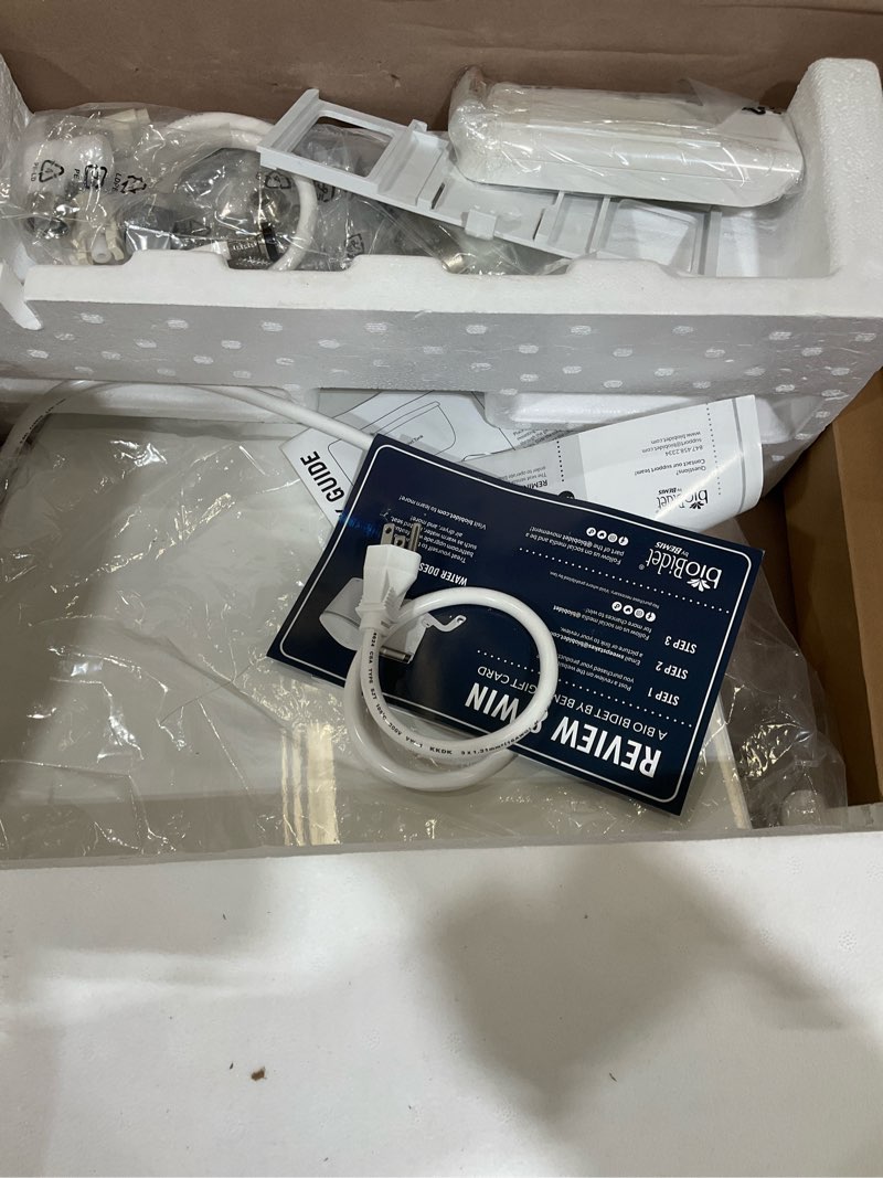 Condition photo showing As Is for Bio Bidet BB2000 Electric Bidet Toilet Seat, Warm Water with Air Dryer, Heated Seat with Sensor and Slow Close Lid, Night Light, Remote Control, Round, White Round Premium Bidet