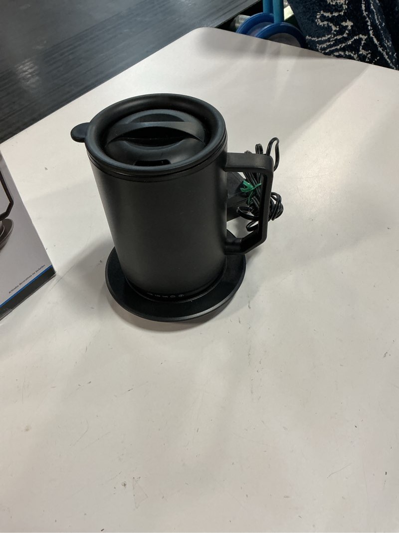 Condition photo showing Good Condition for mainstays warming coffee mug, 12oz. stainless steel coffee mug with mug warmer coaster and lid