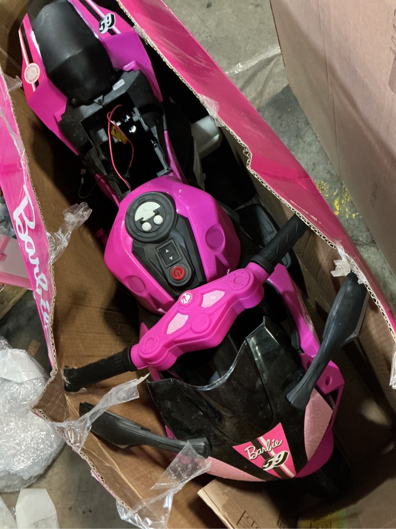 Condition photo showing As Is for 6v barbie motorcycle ride on  max 1 mph  for kids ages 3+ years  by flybar