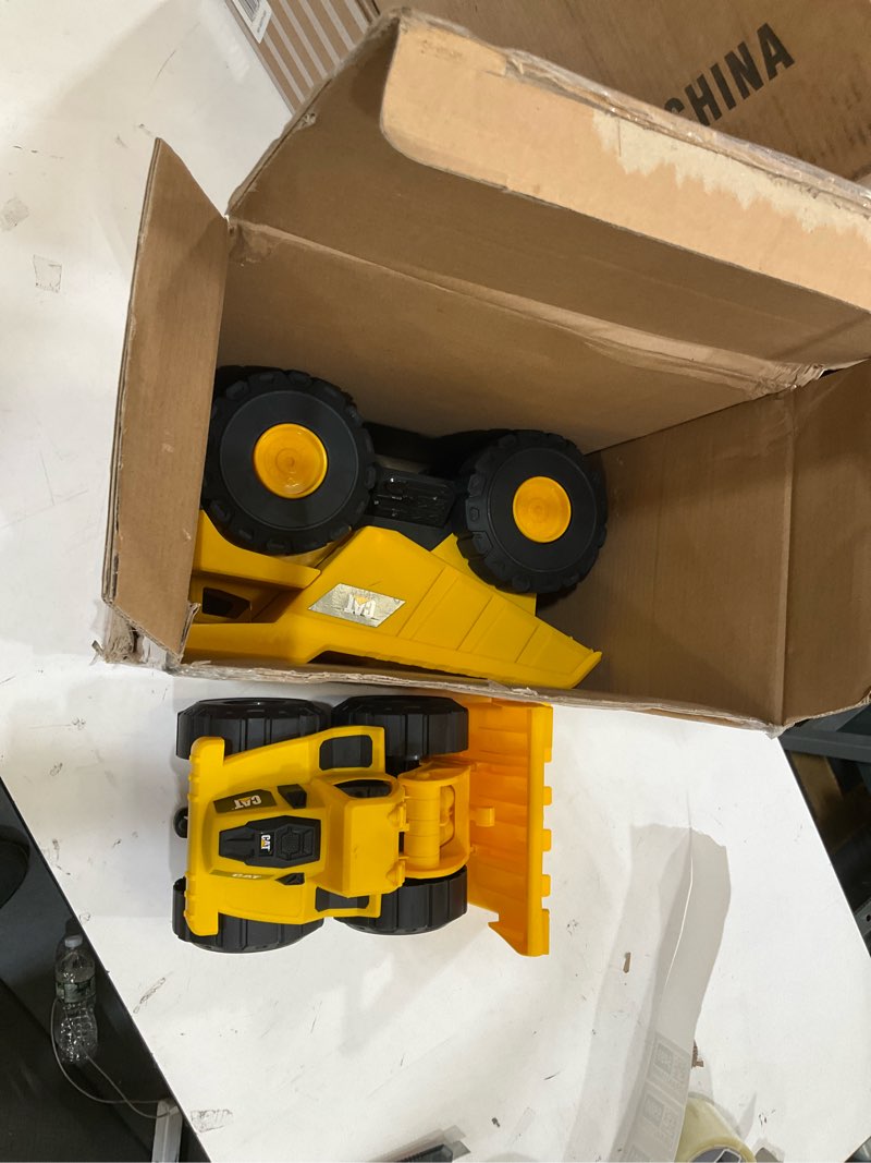 Condition photo showing Good Condition for cat construction toys, tough rigs 15" dump truck & loader set toys 2 pack ages 2+, kid powered caterpillar vehicle set, indoor or outdoor play, no batteries required tough rigs dump truck & wheel loader