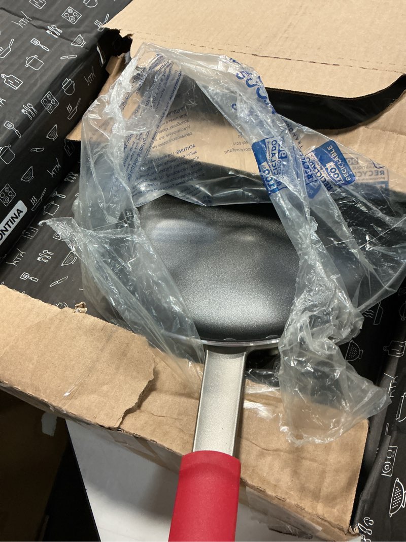 Condition photo showing Good Condition for Tramontina Professional 12-Inch Non Stick Large Frying Pan, Heavy-Gauge Aluminum Skillet with Reinforced Nonstick Coating, Red Handle, Dishwasher and Oven Safe Nonstick 12 Inch
