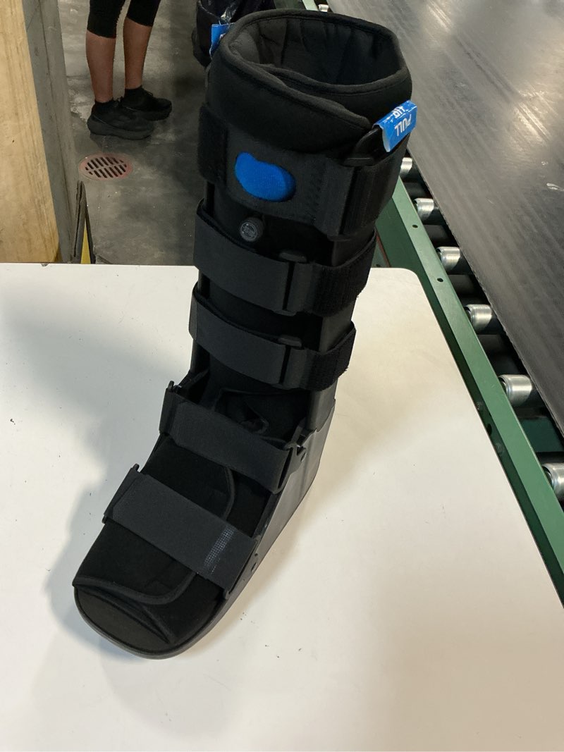 Condition photo showing As Is for advanced orthopaedic pneumatic low profile walker high top cam walker black boot