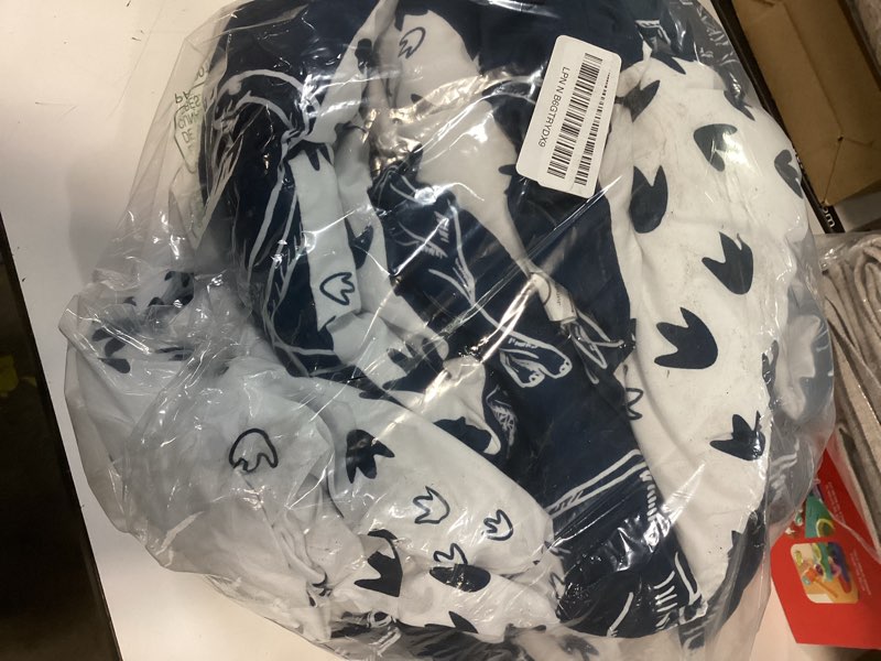 Condition photo showing Good Condition for 4 pieces dinosaur toddler bedding set for boys, soft breathable toddler comforter set, dino print navy, includes reversible comforter, white fitted sheet and flat sheet, pillowcase