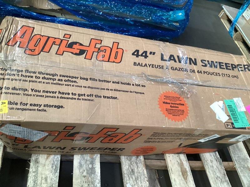 Condition photo showing As Is for Agri-Fab 45-0492 44" Tow-Behind Lawn Sweeper, 28 cu. ft Hopper Bag Capacity; Leaf & Grass Catcher, with Adjustable Brush Height and Dump From Seat Handle