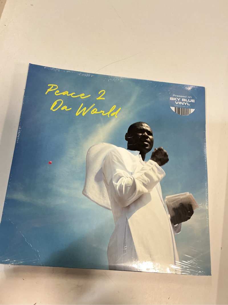 Condition photo showing New/Like New for PEACE 2 DA WORLD (SKY BLUE VINYL)