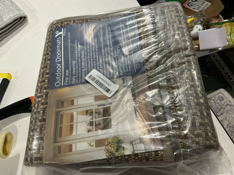Condition photo showing As Is for indoor door mat 24"x72",door mat indoor entrance dirt resistant and absorbent non-slip rubber backing front door mats washable low-profile mats for entryway, inside entrance easy clean brown a- brown 24"x72"