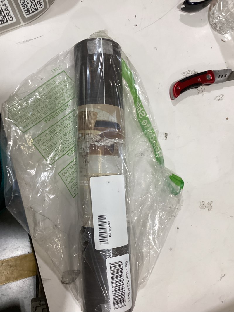 Condition photo showing New/Like New for this is a roll of wood grain contact paper