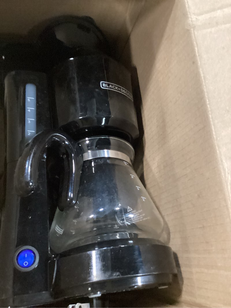 Condition photo showing As Is for BLACK+DECKER 5-Cup Coffee Maker with On/Off Switch, Sneak-A-Cup Feature, and Easy-View Water Window, Black