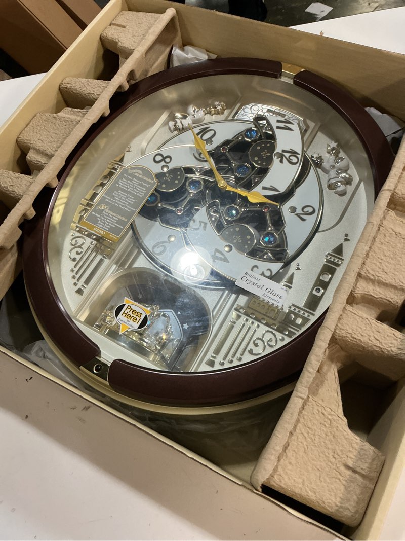 Condition photo showing Good Condition for seiko qxm291brh 18 melodies in motion wall clock with rotating pendulum