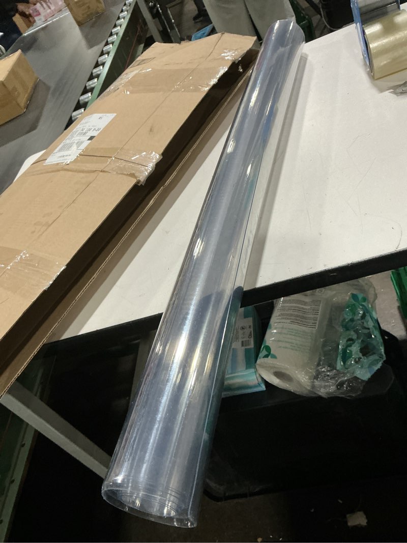 Condition photo showing As Is for 42"X78"Crystal PVC Table Cover Protector, Waterproof PVC Tablecloth, 2MM Thickened Protector for Table, Desk, Coffee Table, Workbench,Dresser, TV Stand, Counter 78" x 42" Clear 2mm