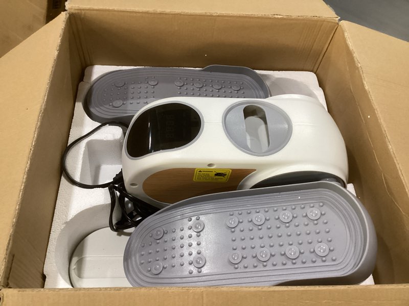 Condition photo showing As Is for merach under desk elliptical machine, leg exerciser while sitting for seniors with remote control & 12-speeds, quiet portable electric seated pedal exerciser machine for home office white, not tested