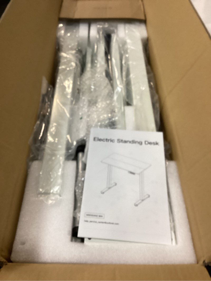 Condition photo showing Good Condition for HUANUO 32" Small Electric Standing Desk Adjustable Height, 4 Memory Height Settings, Sit Stand Up Desk for Home Office & Computer Workstation, LightWalnut 32" x 19" Light Walnut