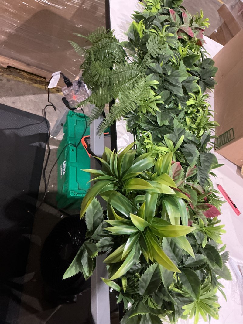 Condition photo showing Good Condition for  artificial plant wall panels feature high-density foliage designed to mimic natural greenery for indoor or outdoor use 