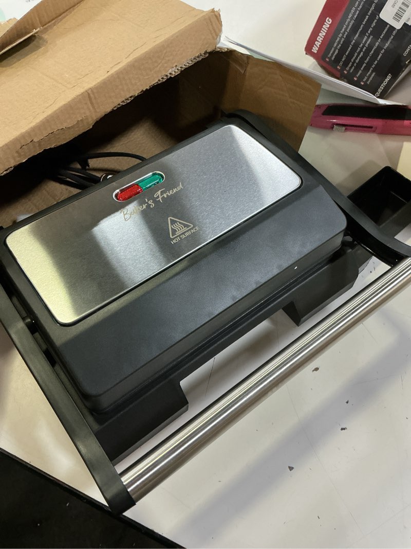 Condition photo showing As Is for baker's friend mini panini press electric griddle, sandwichera electrical for pancakes & eggs, 2 slices of panini grill press sandwich maker press, stainless steel, non stick surfaces, oil tray
