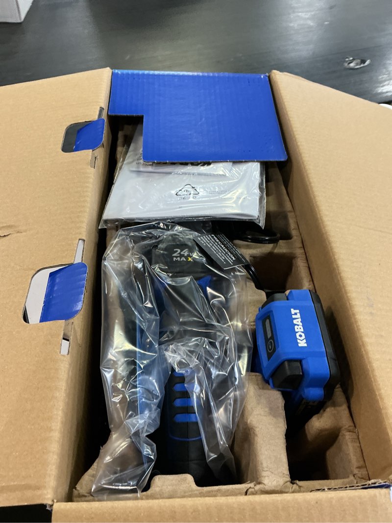 Condition photo showing As Is for kobalt 24-volt 6-in battery 2 ah chainsaw (battery and charger included)