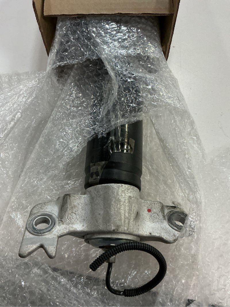 Condition photo showing Good Condition for gm genuine parts 84326293 rear driver side shock absorber with upper mount