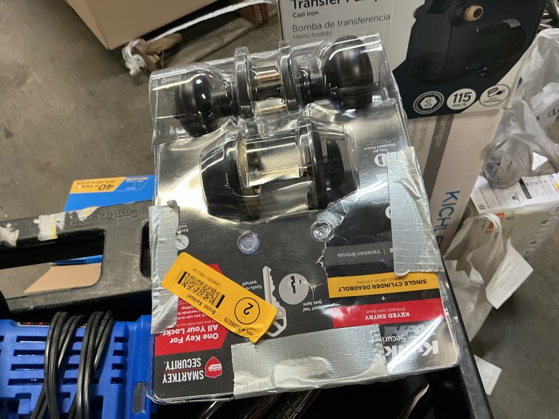 Condition photo showing As Is for kwikset smartkey security cove venetian bronze deadbolt and entry door knob kw1 2-3/4 in.