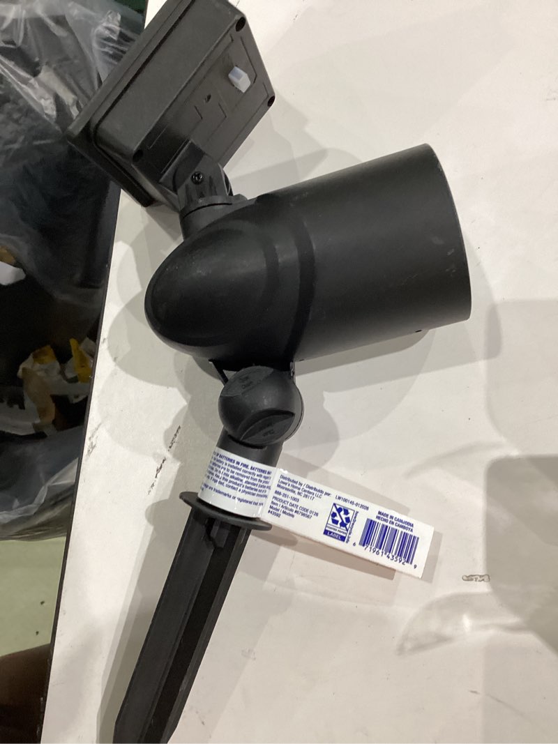 Condition photo showing As Is for harbor breeze 30 -lumens matte black warm white solar led spot light