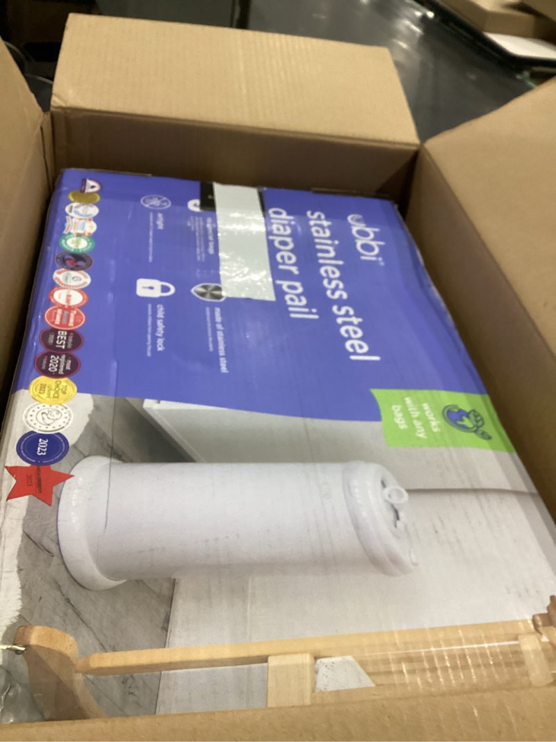 Condition photo showing As Is for Ubbi Steel Diaper Pail, Odor Locking, No Special Bag Required, Award-Winning, Registry Must-Have, White
