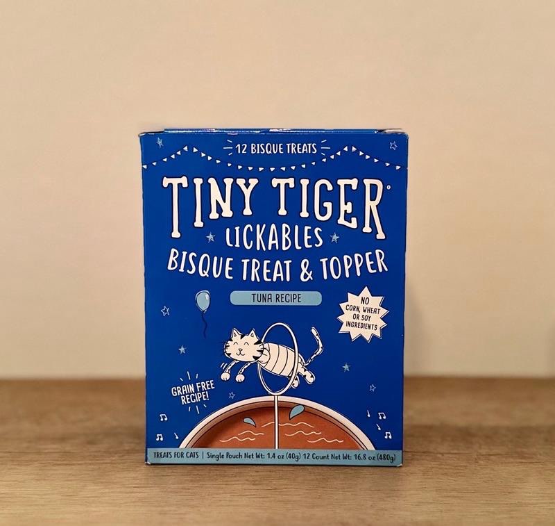 Condition photo showing New/Like New for Tiny Tiger Lickables Bisque Tuna Recipe Cat Treat & Topper, 1.4-oz pouch, bundle of 48 (4 x cases of 12)