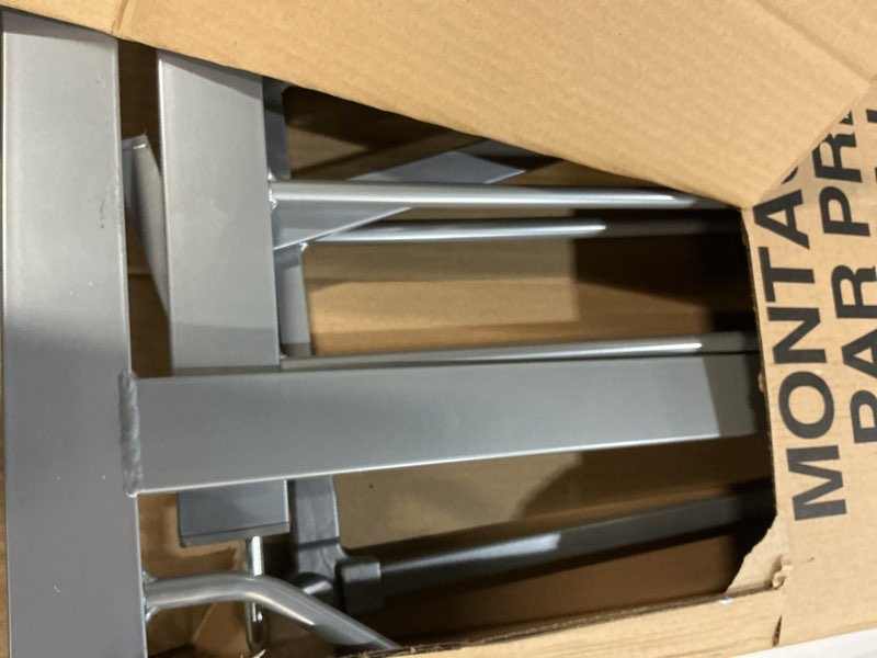 Condition photo showing As Is for regalo easy step 49-inch extra wide baby gate, includes 4-inch and 12-inch extension kit, 4 pack of pressure mount kit and 4 pack of wall mount kit, platinum - total pack of 1