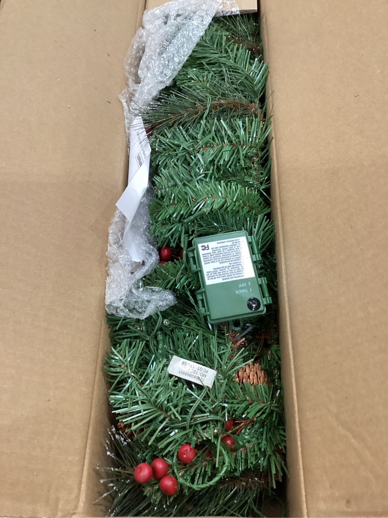 Condition photo showing Good Condition for national tree company 9 ft pre-lit crestwood spruce artificial christmas garland, christmas decoration with glitter, pinecones, red berries, 50 warm white led lights, 180 tips, timer, green battery operated tree