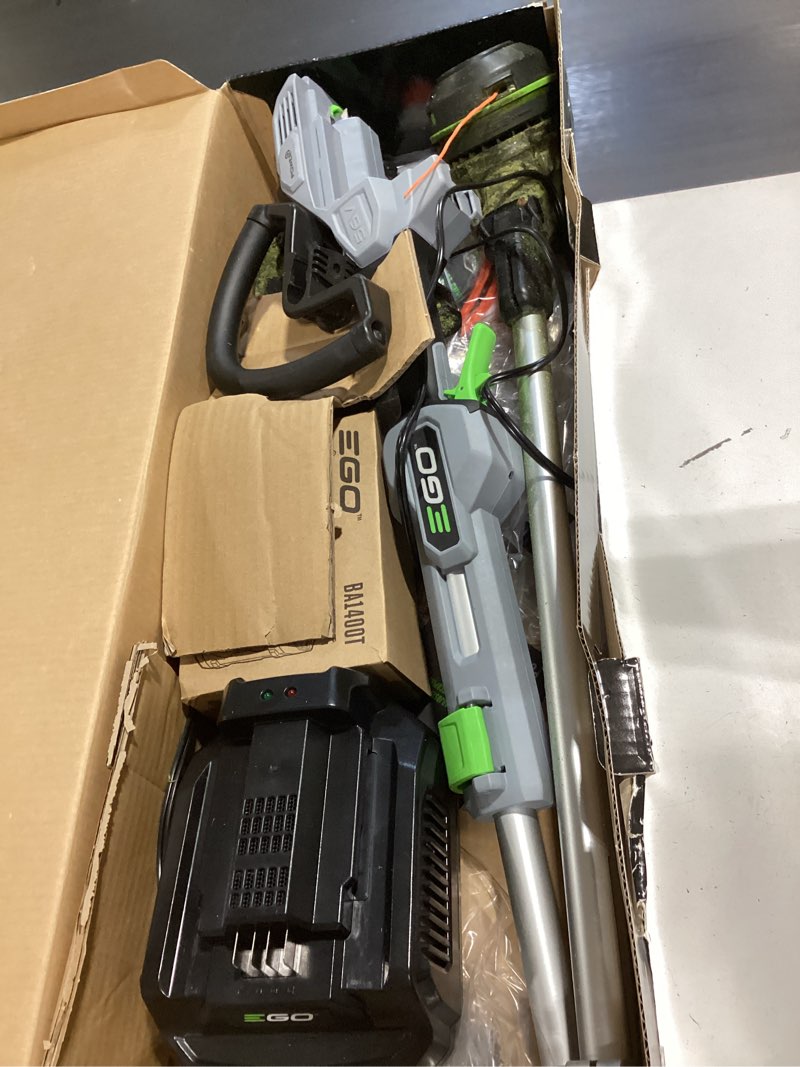 Condition photo showing As Is for ego powerload 56-volt 15-in telescopic shaft battery string trimmer 2.5 ah (battery and charger included)