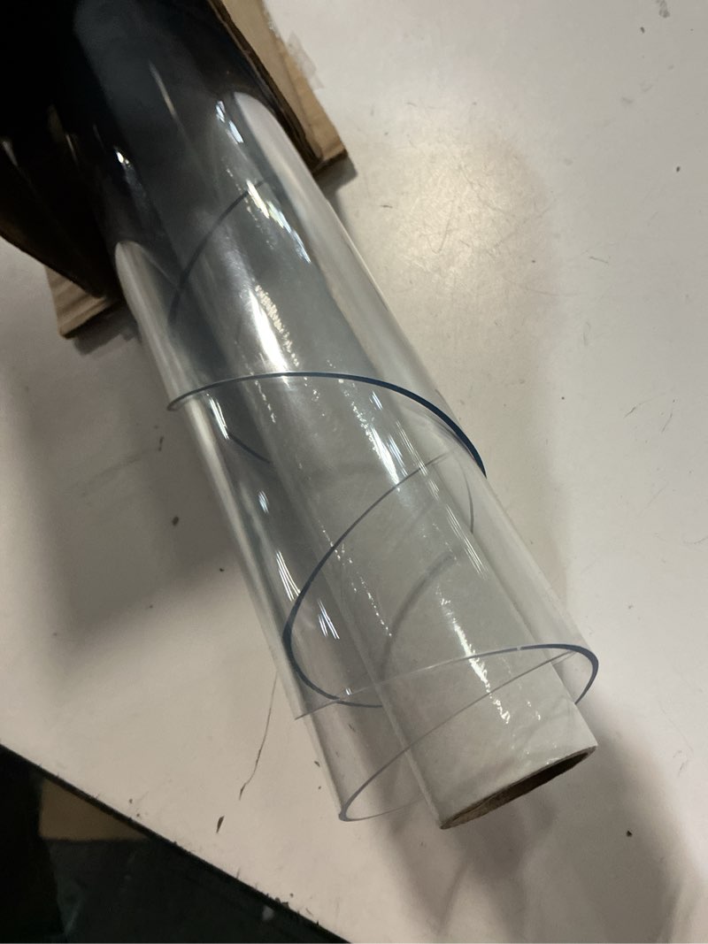 Condition photo showing As Is for 47 Inch Round Clear Table Cover Protector, Clear Round Protector for Dining Room Table, 1.5mm Thick Waterproof Round Plastic Vinyl Table Pad Clear 1.5mm 47" (Round)