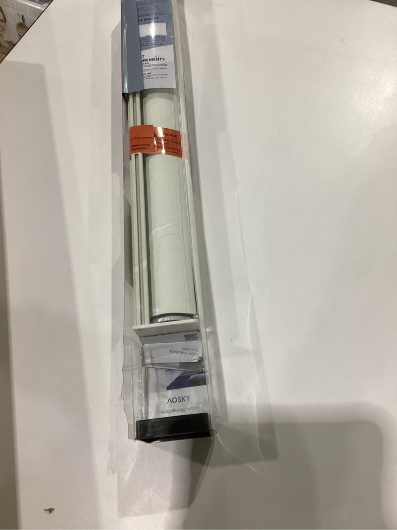 Condition photo showing As Is for AOSKY Blackout Roller Shades Cordless Blinds for Windows, Free-Stop Shades with Valance, Thermal Insulated Fabric, UV Protection, Natural Woven Blinds for Home and Office (20\" W x 72\" H, Ivory) Ivory 20\"W x 72\"H, SIMILAR TO STOCK PHOTO 