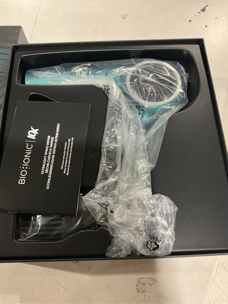 Condition photo showing New/Like New for working verified bio ionic 10x ultralight speed hair dryer, blow dryer with adjustable heat & speed, memory function, professional hair styling tool for fast, frizz-free hairstyles teal tides limited edition