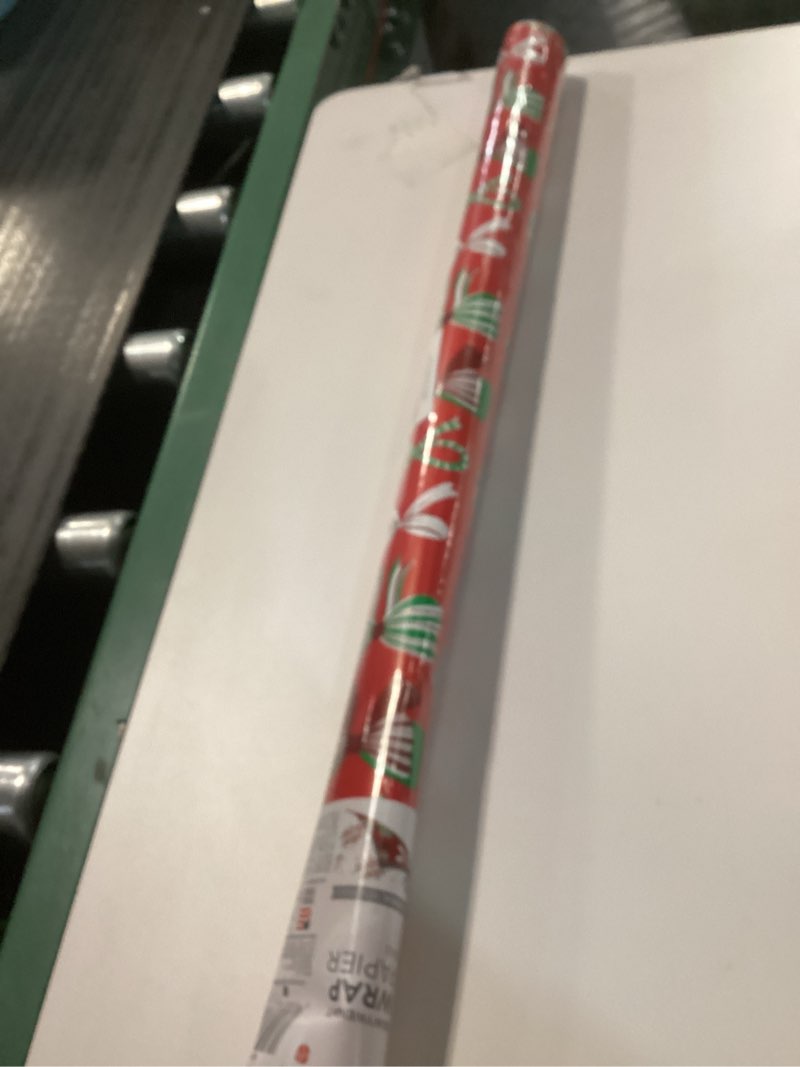 Condition photo showing Good Condition for American Greetings Reversible Christmas Wrapping Paper Roll, Cute Red and Green Bows Holiday Gift Wrap (60 sq. ft., 1 Standard Roll) Cute Bows Red and Green