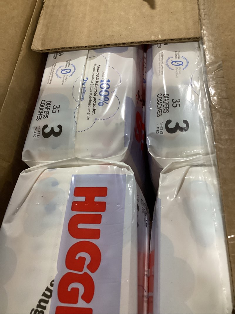 Condition photo showing As Is for huggies snug & dry disposable diapers - econ+ pack - size 3 - 210ct