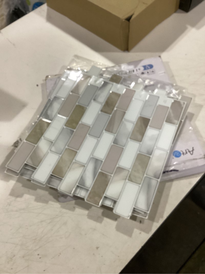 Condition photo showing Good Condition for art3d 10-sheet peel and stick backsplash tile for kitchen - 12”×12” stick on wall tile for kitchen bathroom countertop living room, beige & white