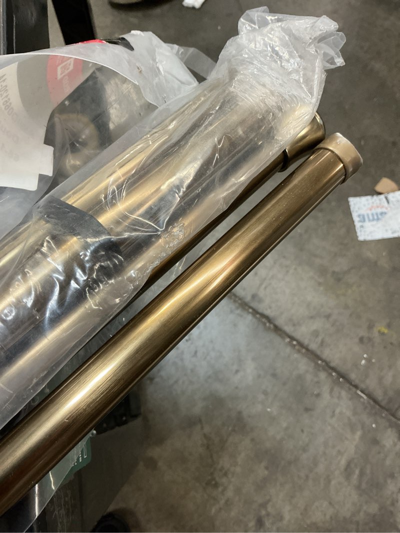 Condition photo showing As Is for rod desyne 4737-664 topper 3/4 inch dia. 66-120"-antique brass double curtain rod set