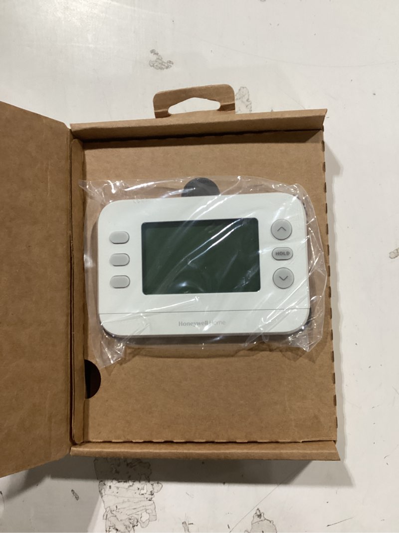 Condition photo showing As Is for New! Honeywell Home Programmable Thermostat, Single-Stage, 1 Heat/1 Cool Compatibility, 5-2 Day Schedule, X2P, White, RTH20B Single-Stage Compatible 5-2 Day Programmable