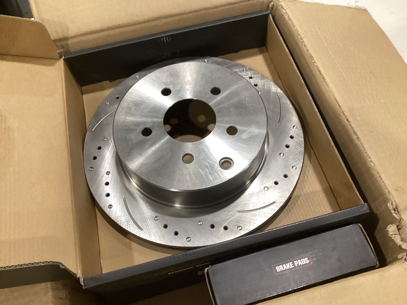 Condition photo showing As Is for rear brake kits compatible with 2014-2020 infinitl qx60, 2014-2018 q50, 2003-2012 fx35, 2011-2013 m37 | oe drilled slotted brake rotors & ceramic brake pads, 307.6mm (12.1in) | 31348 d905