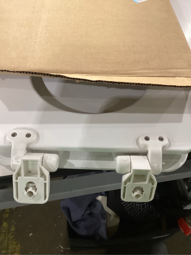 Condition photo showing As Is for mayfair linden slow close toilet seat, non slip heavy duty wood, easy install, elongated, white elongated traditional hinge
