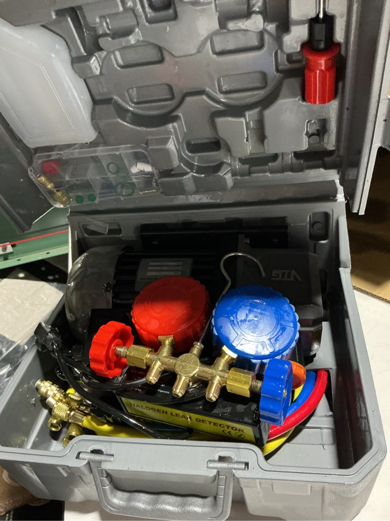 Condition photo showing As Is for vtg vogten 4.5 cfm ac vacuum pump and gauge set,for mini split/hvac/auto systems,manifold gauge kit fits r134a r12 r22 r502,with leak detector,upgraded trifold storage case,3 hoses,2 r134a can taps 4.5 cfm&3 way(r134a r12 r22 r502 compatible)
