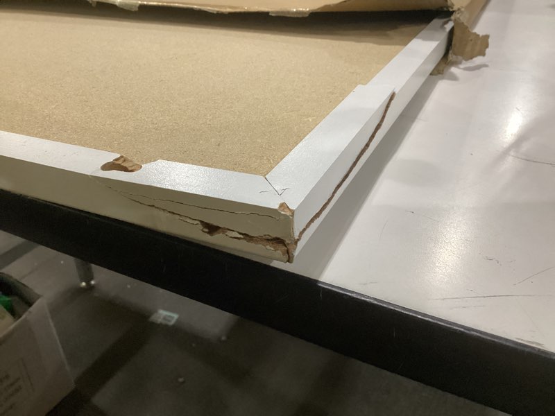Condition photo showing As Is for cork board bulletin board, 36\" x 24\" corkboard for wall, rustic white wooden frame, hanging pin board for home & office decor, 10 push pins white frame 36\"x24\", damaged