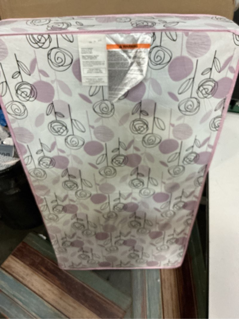 Condition photo showing New/Like New for dream on me floral dreams 2-in-1 crib mattress, dual-sided for infants & toddlers, waterproof cover, greenguard gold certified, fits full size crib & toddler bed, 52” x 28” x 5”