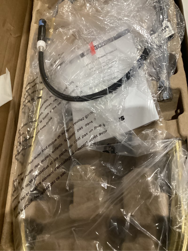 Condition photo showing As Is for KRAUS Oletto High-Arc Single Handle Pull-Down Kitchen Faucet in Brushed Brass, KPF-2821BB Brushed Bronze 21 Inch High Arc Faucet