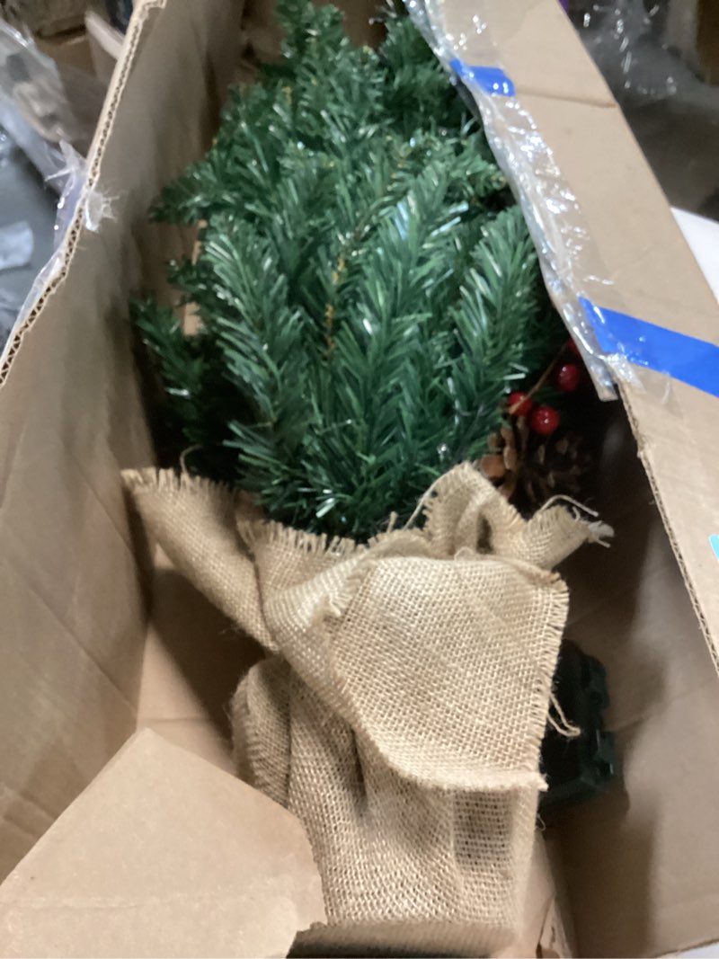 Condition photo showing Good Condition for 3ft Pre-lit Mini Christmas Tree,Artificial Pine 121 PVC Branches Tips with 11 Red Berries & 11 Pinecone & 70 LED String Lights & Burlap Wrapped Base Decor Xmas Tree for Tabletop,Battery Operated Green 3ft