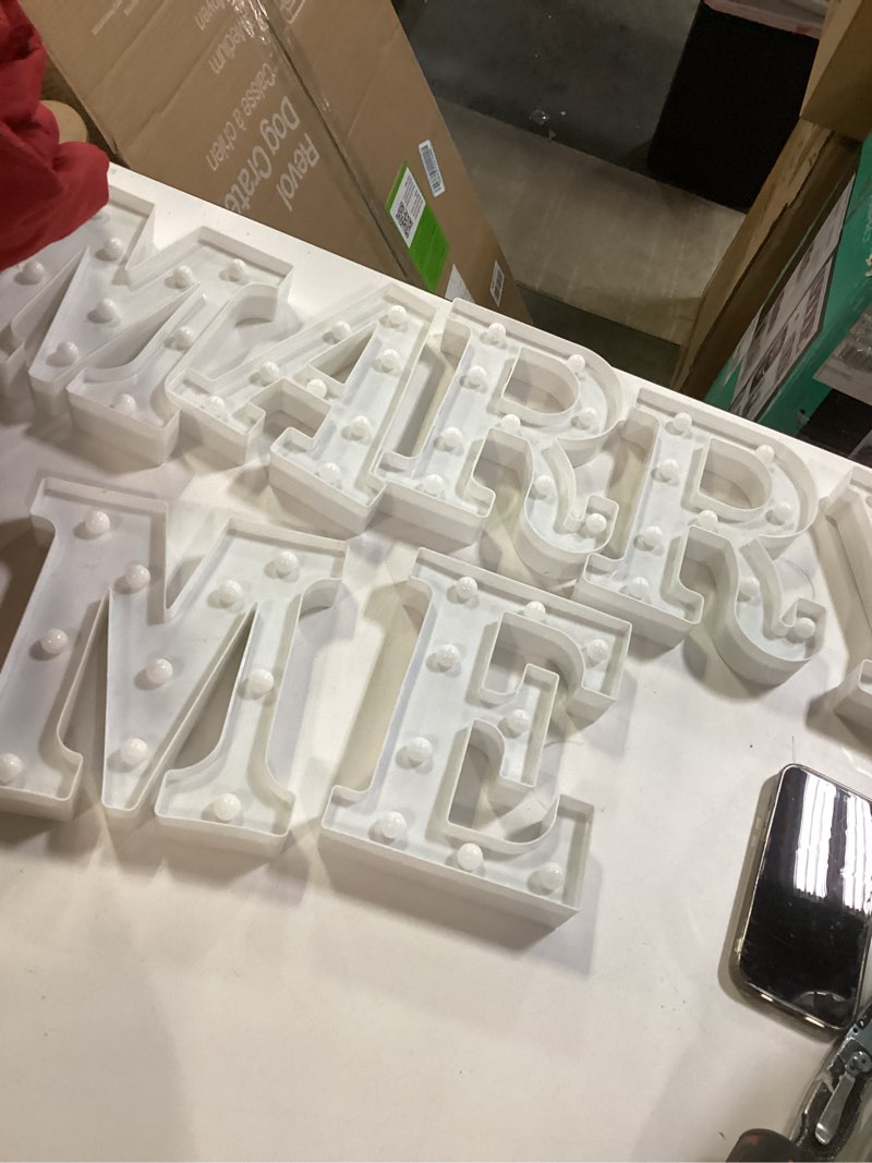 Condition photo showing As Is for Proposal Decorations Kit, Marry Me Light Up Letters, 2000 Rose Petals, 24 Heart Shaped Romantic Candles, Red Carpet Aisle Runner 16 Feet, 10 Red Heart Balloons, 1 Engagement Rose Ring Box