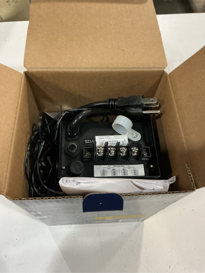 Condition photo showing As Is for harbor breeze 60 -watt multi-tap transformer landscape lighting transformer with digital timer and dusk-to-dawn sensor